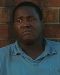 Quinton Aaron'un fotoğrafı.